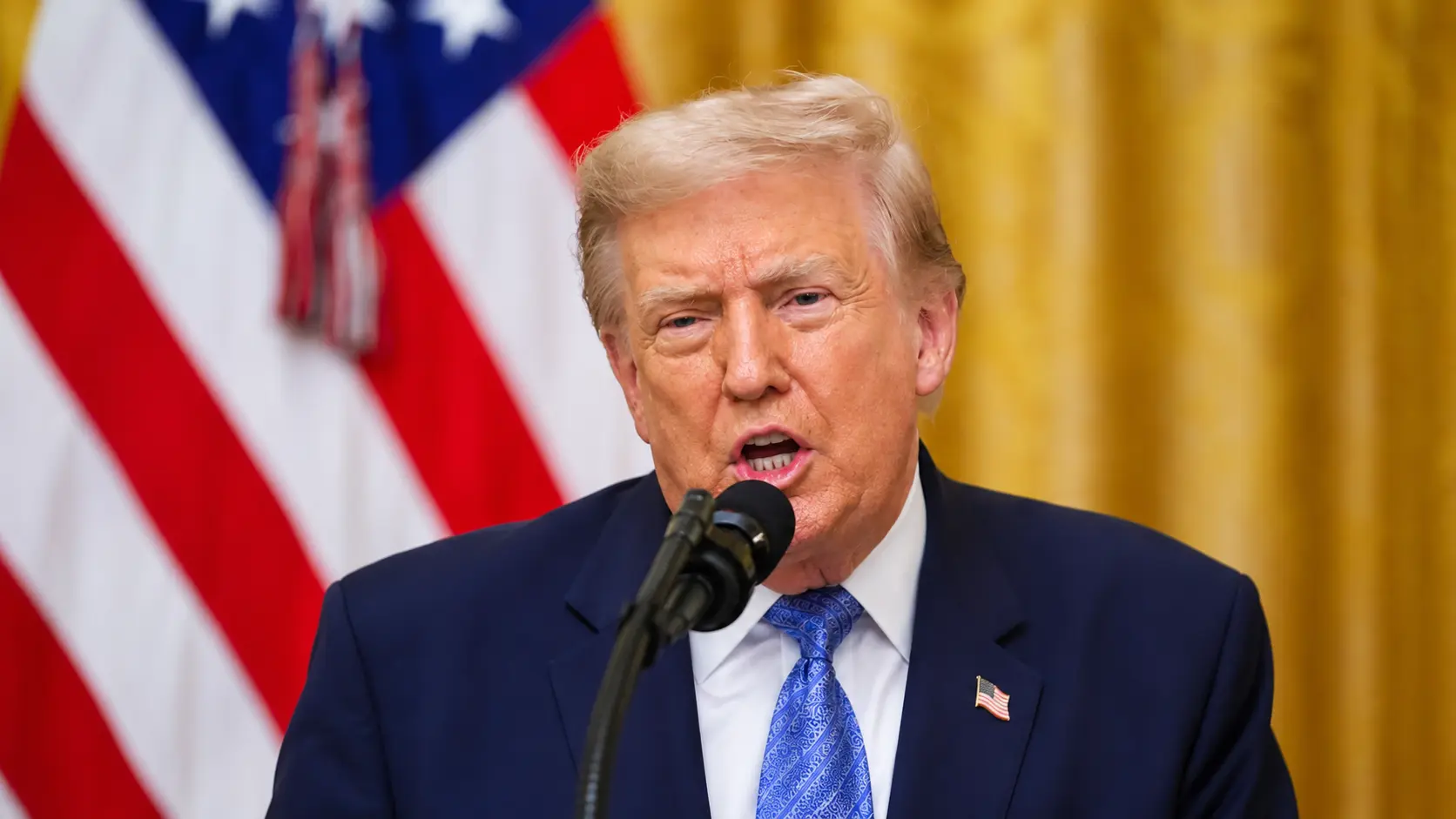 US President Donald Trump speaking at the White House about alleged Chinese access to US voter data and election security vulnerabilities.