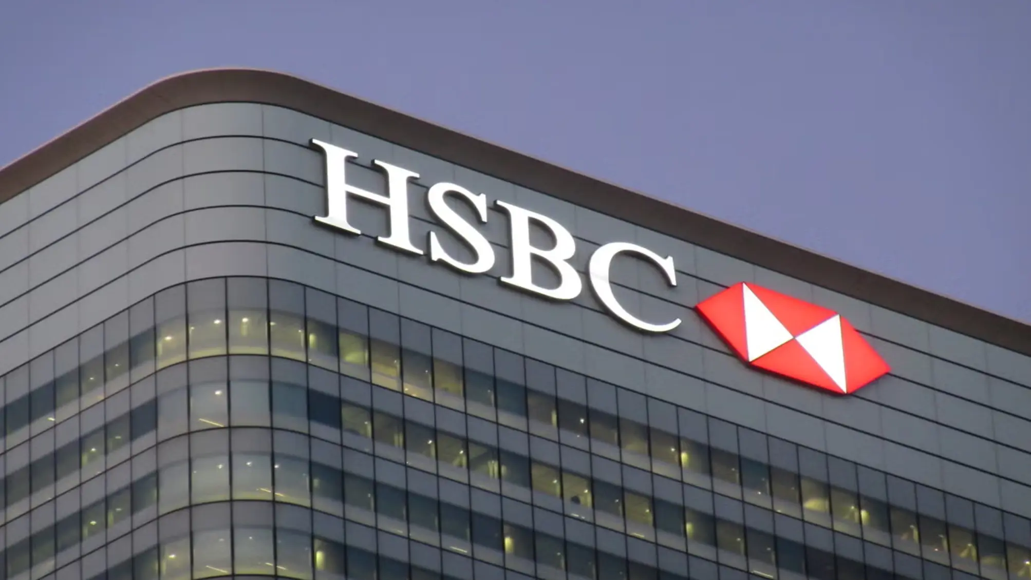 HSBC and Allianz logos representing the $2.1 billion acquisition of HSBC's Singapore insurance business.