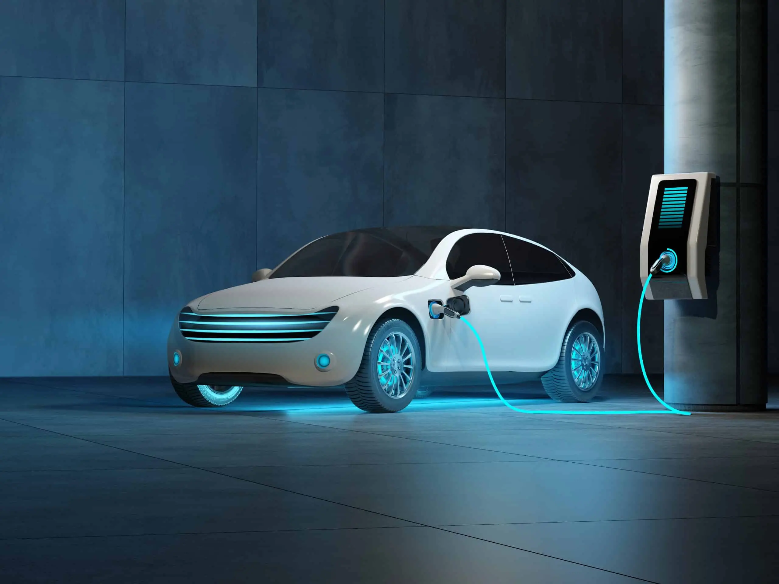 Modern electric vehicles displayed in a high-tech showroom connected to an advanced manufacturing facility.