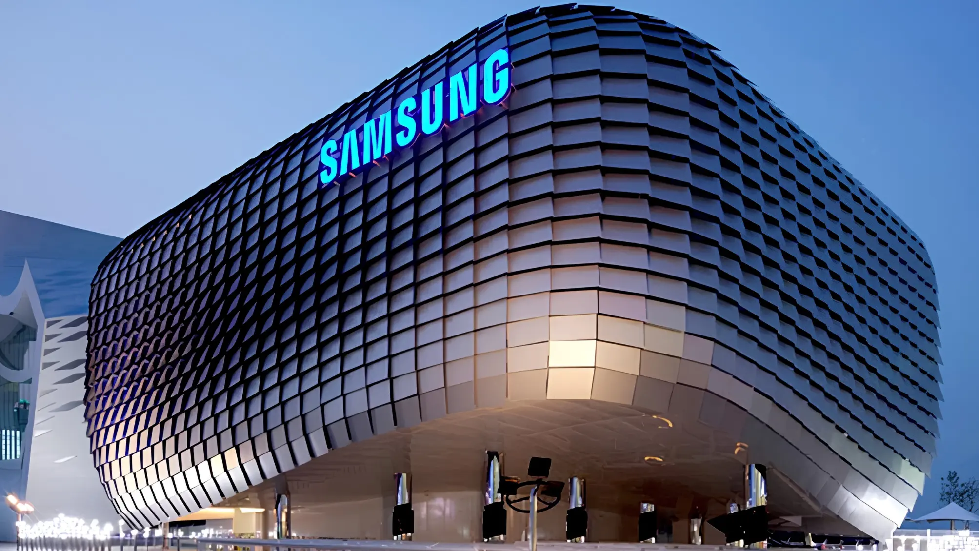 Samsung logo representing the company's strong semiconductor earnings and forecast that the global chip shortage will continue through 2028.