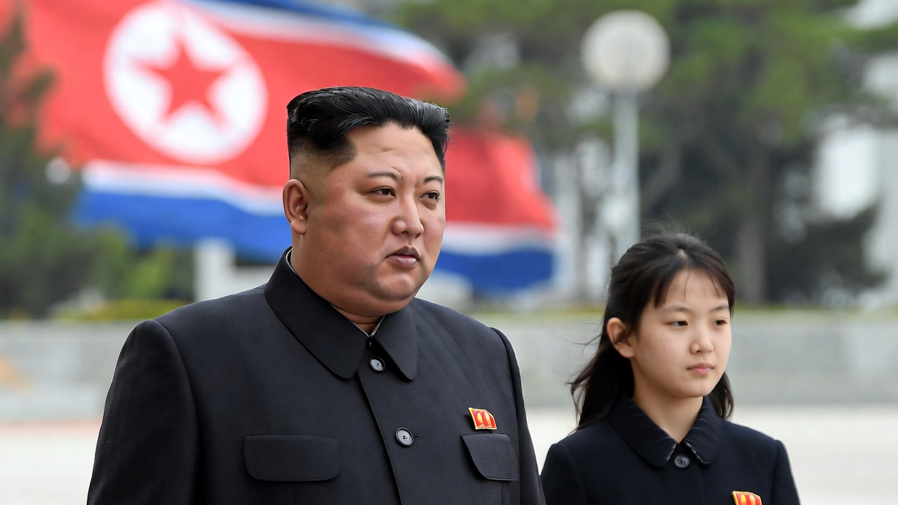 "Kim Jong Un and daughter Kim Ju Ae appear together at a North Korean state ceremony, amid reports of her designation as successor."