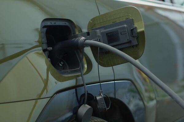 electric cars during high fuel prices charging station scene