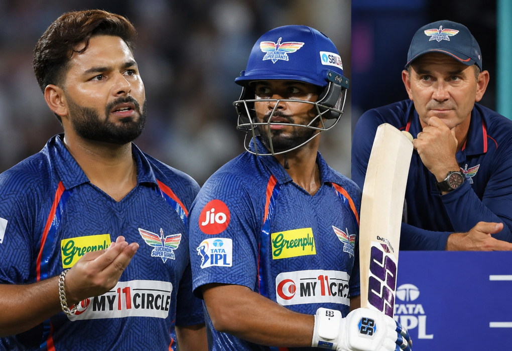 Rishabh Pant and Nicholas Pooran during an IPL match as LSG coach Justin Langer looks on from the dugout